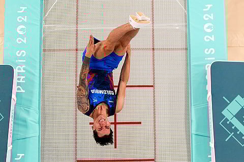 Angel Hernandez of Colombia competes during men's trampoline finals